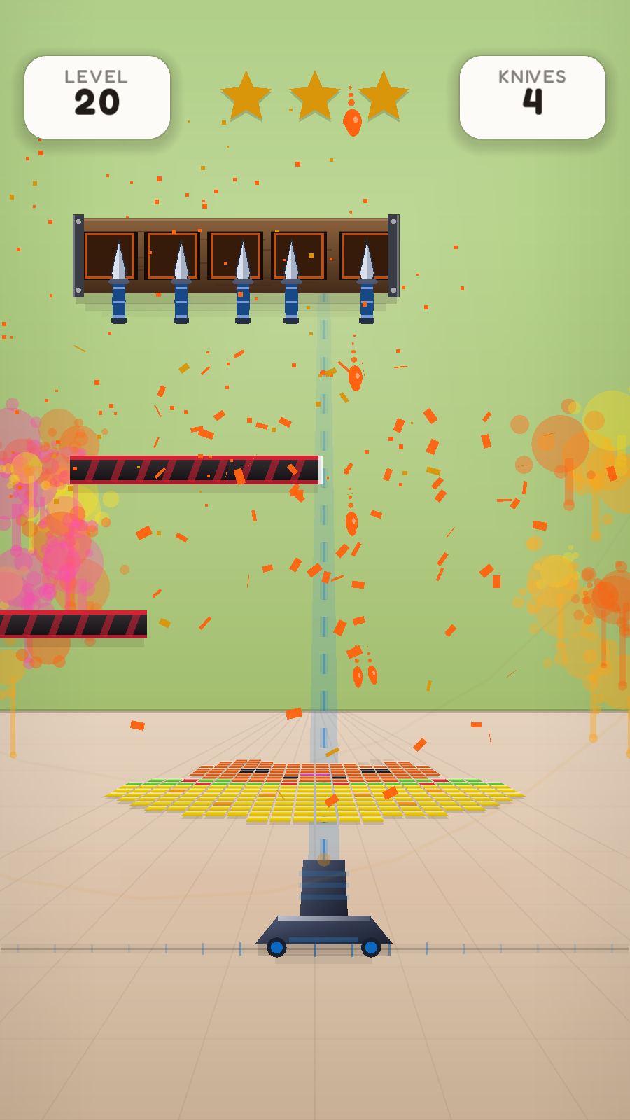 Paintblade gameplay: the last knife of a chapter lands and paint rains onto the pixel picture on the floor